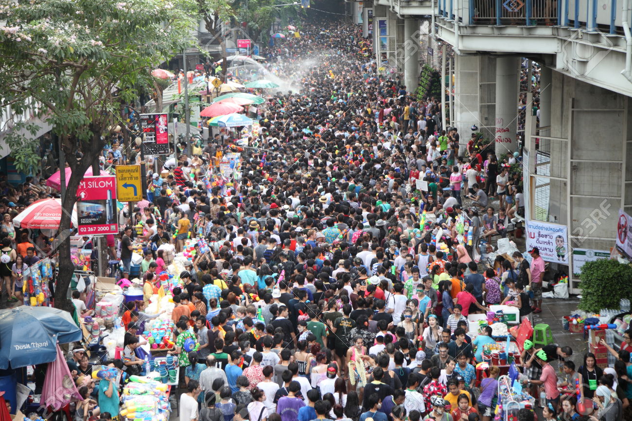 27928812-BANGKOK-APRIL-13-Stream-of-water-over-the-crowd-of-people-during-celebrating-the-traditional-Songkra-Stock-Photo.jpg
